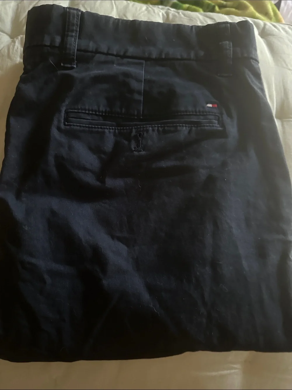 Tommy Hilfiger Men's Navy Flat-Front pants with Signature Flag. Slim fit